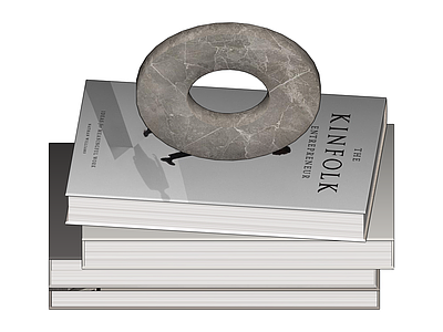 书籍与石雕摆件组合